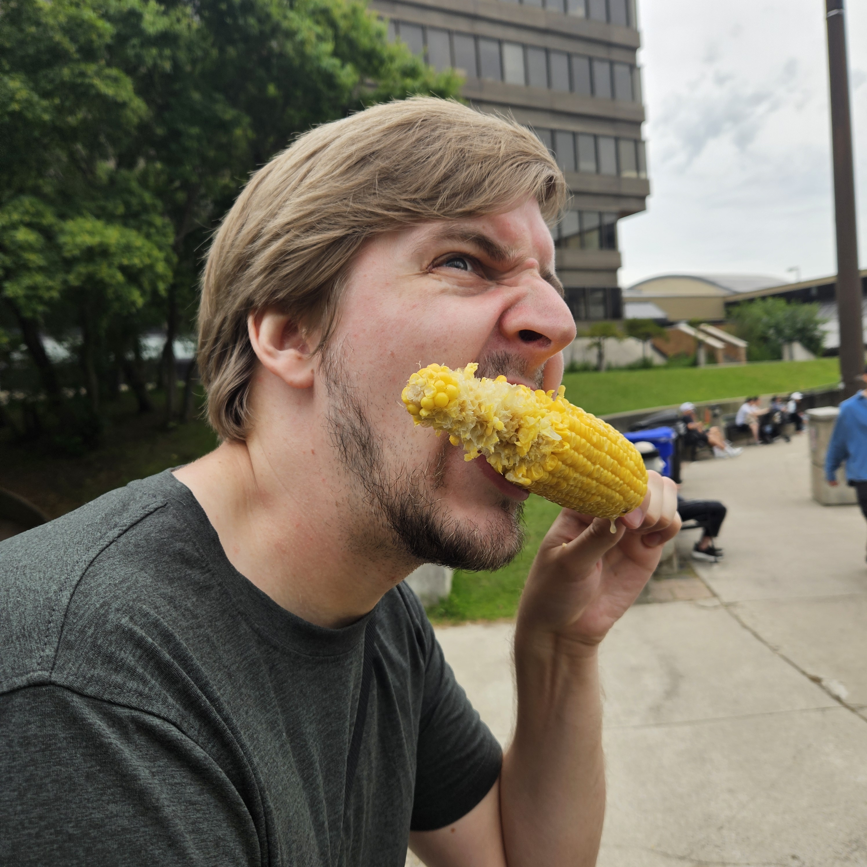 A photo of me eating a big cob of corn